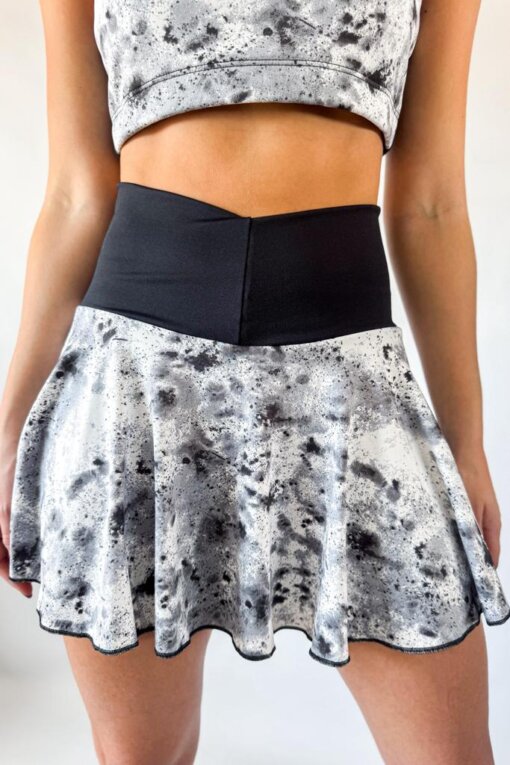 Pollera estampada con ciclista con bolsillos